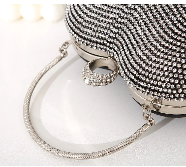 Heart Pattern Diamond Tassel Clutch