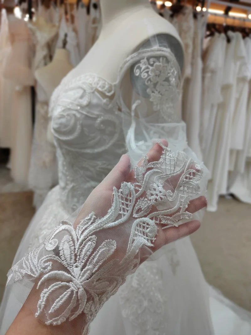 Illusion Lace Long-Sleeve Sequined Ball Gown Wedding Dress - Luzilly Bridal & Apparel