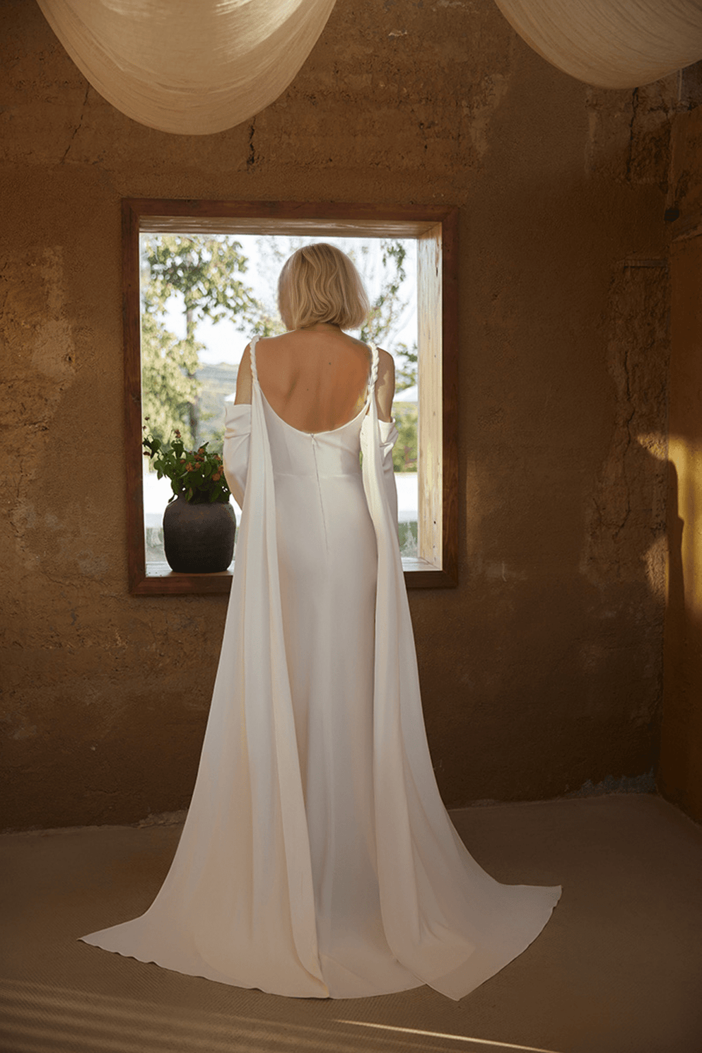 Minimalist Off-Shoulder Satin Wedding Gown with Detachable Sleeves and Elegant Train - Luzilly Bridal & Apparel