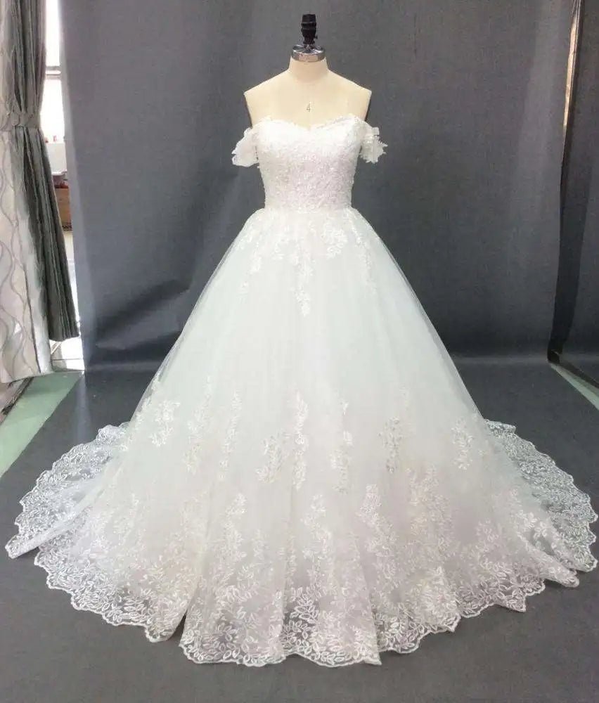 Modest Short Sleeve Embroidered Wedding Dress with Chapel Train - Luzilly Bridal & Apparel